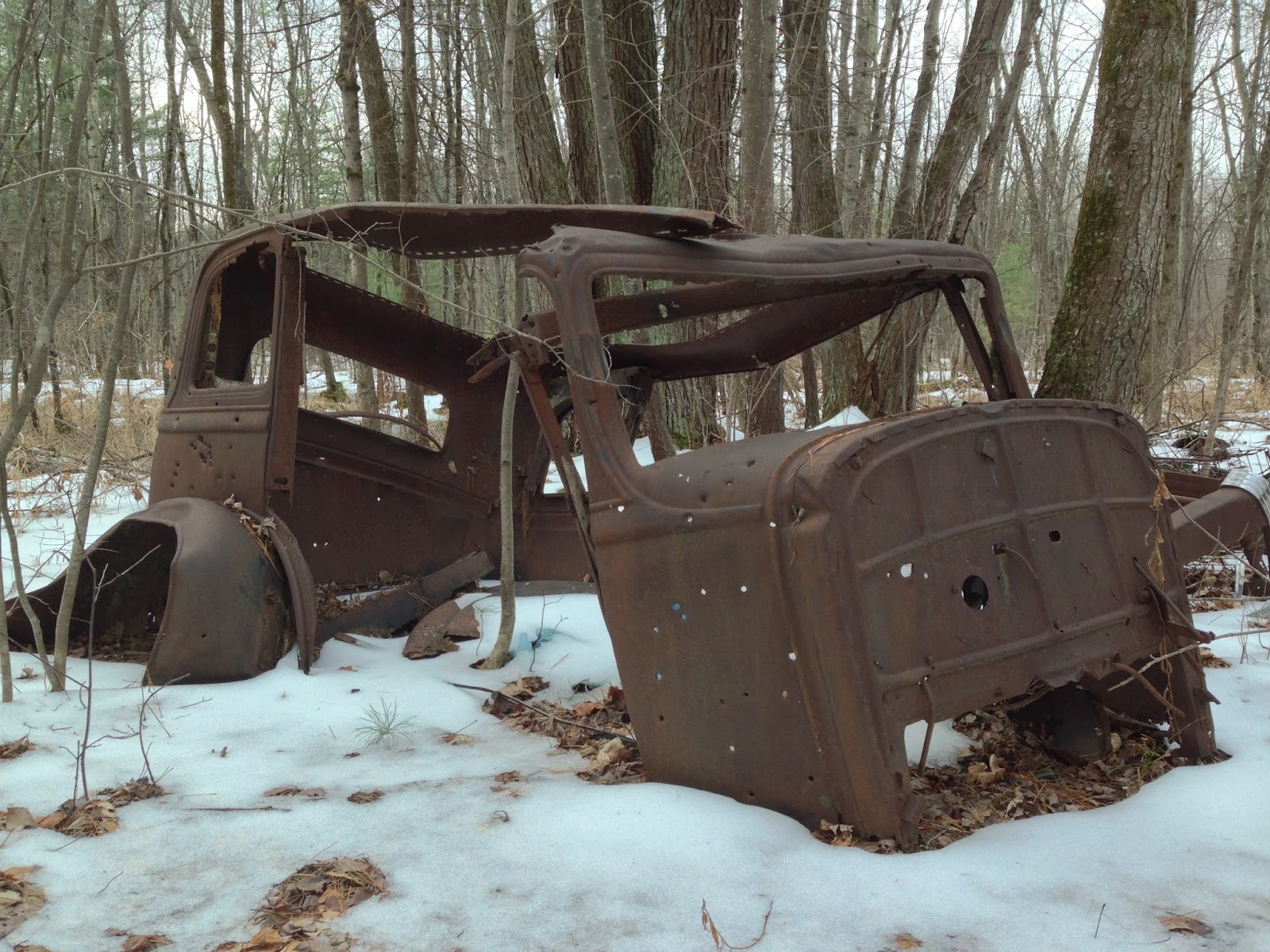 Old car along trail